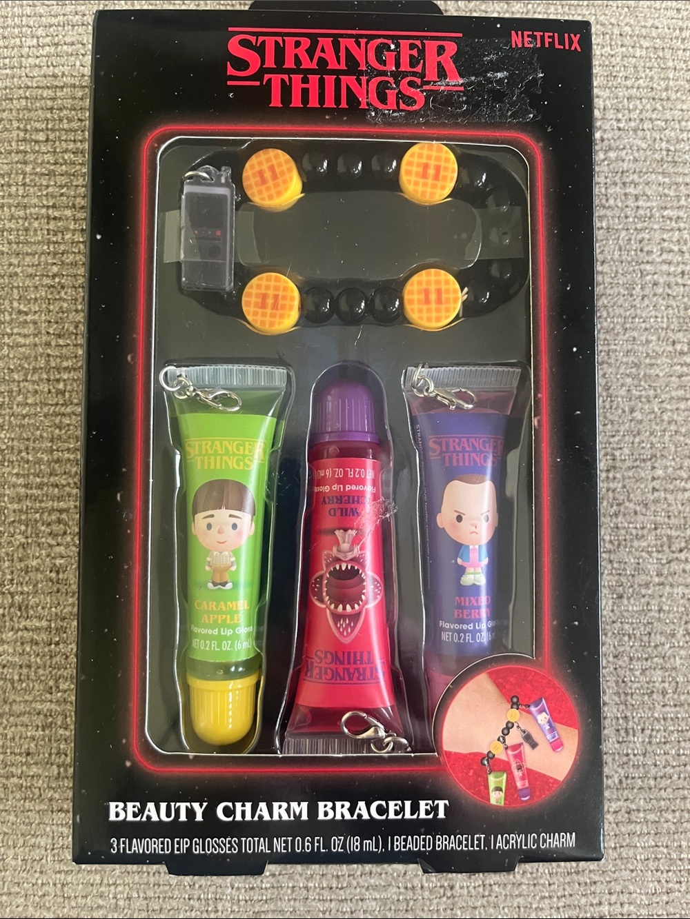 Stranger Things Kids Beauty Charm Bracelet & 3 flavored lip gloss